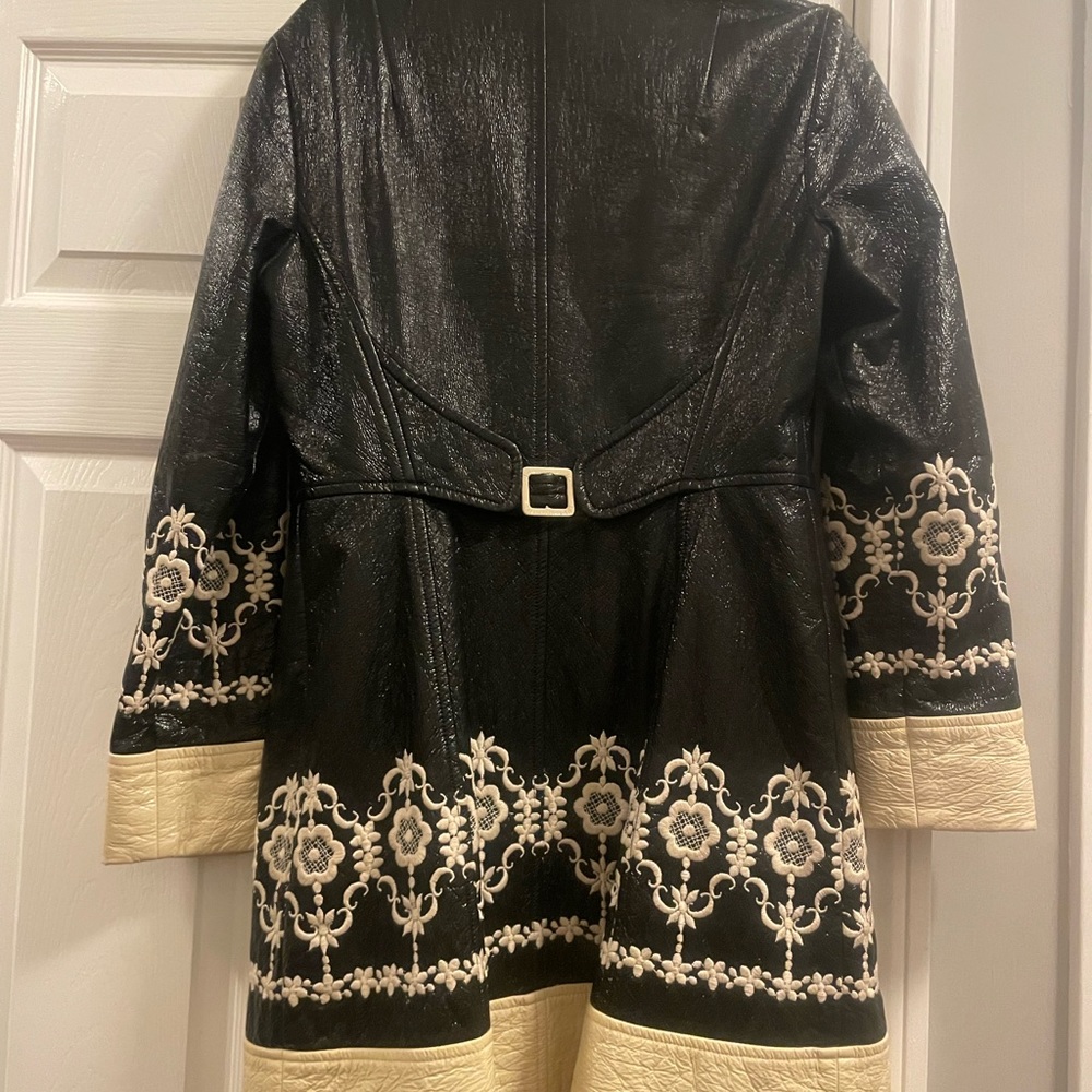 Nenette Lepore raincoat with embroidery.